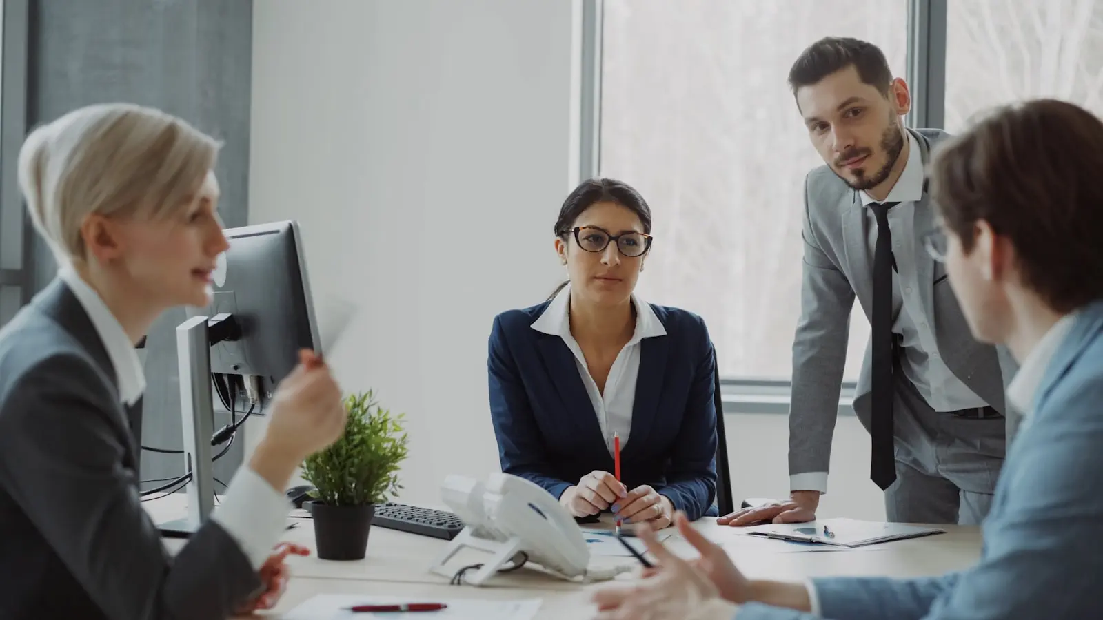 Senior colleagues in a focused meeting